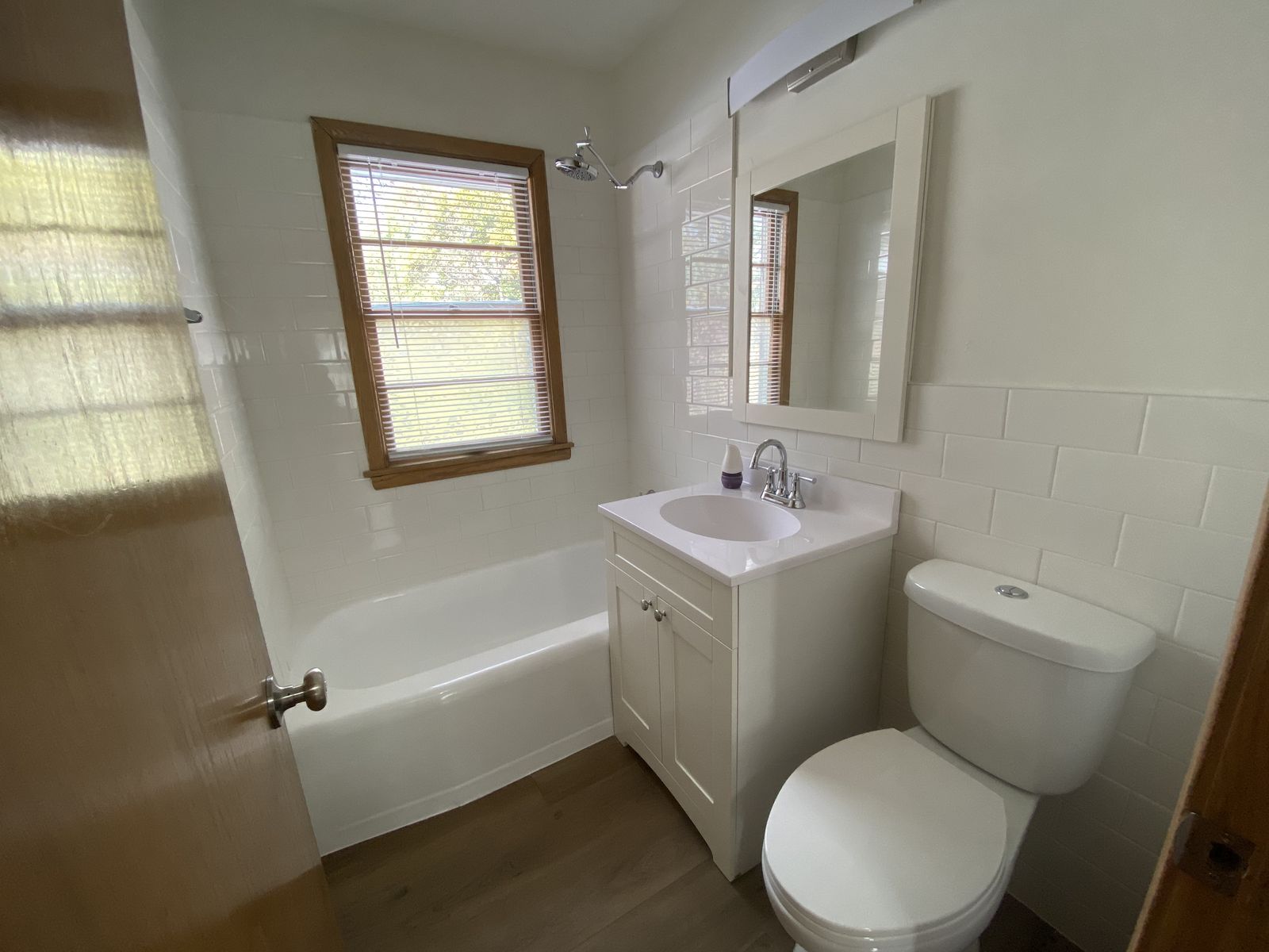 Renovated bathroom with new vanity and fixtures